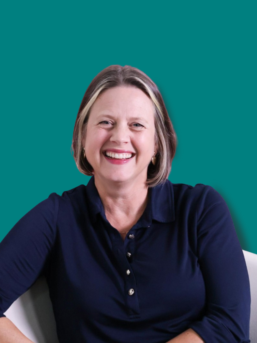 Rose Headshot Rose Fuller, career consultant in Naples FL, smiling professional headshot on teal background